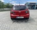 Красный Мазда 3, объемом двигателя 2 л и пробегом 245 тыс. км за 5300 $, фото 4 на Automoto.ua