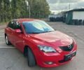 Красный Мазда 3, объемом двигателя 1.6 л и пробегом 215 тыс. км за 5500 $, фото 1 на Automoto.ua