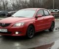 Красный Мазда 3, объемом двигателя 1.6 л и пробегом 249 тыс. км за 5699 $, фото 1 на Automoto.ua