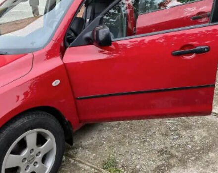 Мазда 3 2005 в Береговом на Automoto.ua Красный Мазда 3, объемом двигателя 1.35 л и пробегом 195 тыс. км за 5100 $, фото 3 на Automoto.ua