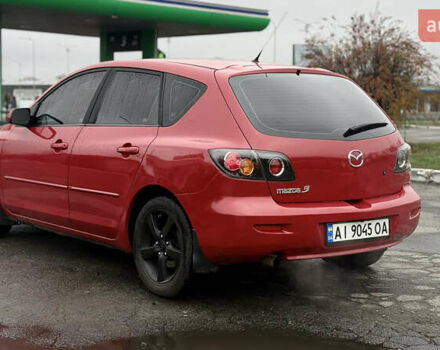 Красный Мазда 3, объемом двигателя 1.6 л и пробегом 249 тыс. км за 5699 $, фото 6 на Automoto.ua