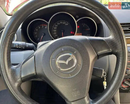 Мазда 3 2005 в Береговом на Automoto.ua Красный Мазда 3, объемом двигателя 1.35 л и пробегом 195 тыс. км за 5100 $, фото 6 на Automoto.ua