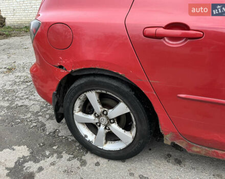 Червоний Мазда 3, об'ємом двигуна 1.6 л та пробігом 289 тис. км за 2700 $, фото 6 на Automoto.ua