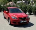Красный Мазда 3, объемом двигателя 1.6 л и пробегом 308 тыс. км за 4200 $, фото 1 на Automoto.ua