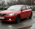 Красный Мазда 3, объемом двигателя 1.6 л и пробегом 249 тыс. км за 5699 $, фото 1 на Automoto.ua