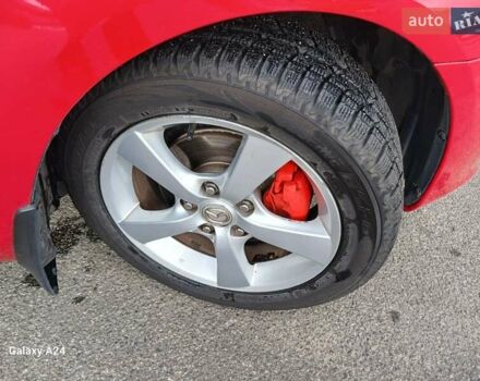 Мазда 3 2005 в Киеве на Automoto.ua Красный Мазда 3, объемом двигателя 1.6 л и пробегом 160 тыс. км за 5500 $, фото 4 на Automoto.ua