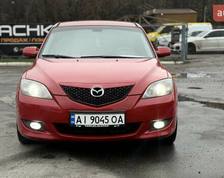 Красный Мазда 3, объемом двигателя 1.6 л и пробегом 249 тыс. км за 5699 $, фото 1 на Automoto.ua