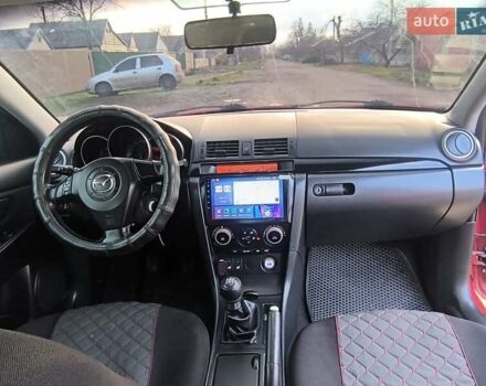 Красный Мазда 3, объемом двигателя 2 л и пробегом 256 тыс. км за 4800 $, фото 1 на Automoto.ua