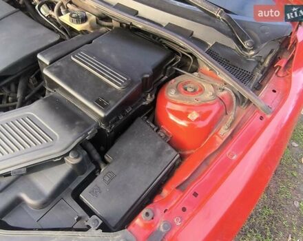 Красный Мазда 3, объемом двигателя 2 л и пробегом 256 тыс. км за 4800 $, фото 10 на Automoto.ua