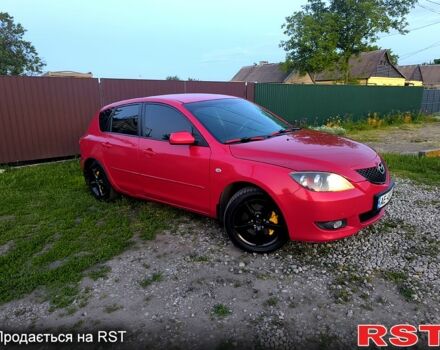 Красный Мазда 3, объемом двигателя 2 л и пробегом 255 тыс. км за 4800 $, фото 1 на Automoto.ua