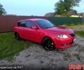 Красный Мазда 3, объемом двигателя 2 л и пробегом 255 тыс. км за 4800 $, фото 1 на Automoto.ua