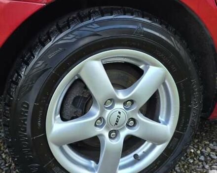 Красный Мазда 3, объемом двигателя 1.6 л и пробегом 205 тыс. км за 4938 $, фото 26 на Automoto.ua