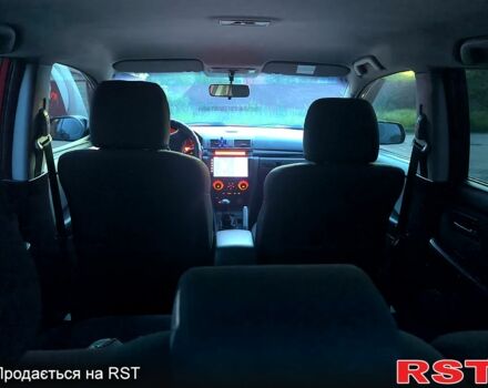Красный Мазда 3, объемом двигателя 2 л и пробегом 255 тыс. км за 4800 $, фото 6 на Automoto.ua