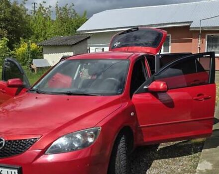 Красный Мазда 3, объемом двигателя 1.6 л и пробегом 205 тыс. км за 4938 $, фото 2 на Automoto.ua