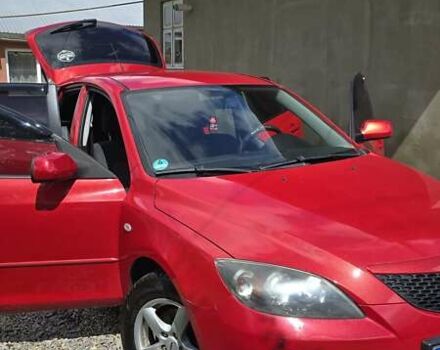 Красный Мазда 3, объемом двигателя 1.6 л и пробегом 205 тыс. км за 4938 $, фото 9 на Automoto.ua