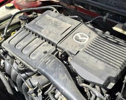 Красный Мазда 3, объемом двигателя 1.6 л и пробегом 205 тыс. км за 4938 $, фото 13 на Automoto.ua