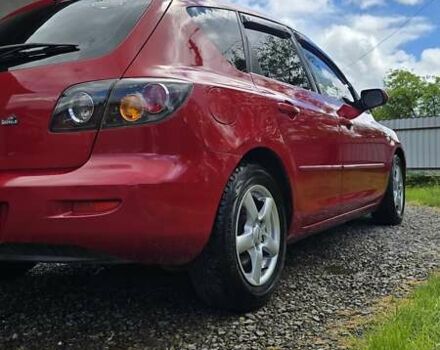 Красный Мазда 3, объемом двигателя 1.6 л и пробегом 205 тыс. км за 4938 $, фото 5 на Automoto.ua