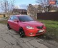 Красный Мазда 3, объемом двигателя 2 л и пробегом 256 тыс. км за 4800 $, фото 1 на Automoto.ua