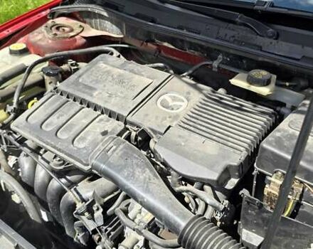 Красный Мазда 3, объемом двигателя 1.6 л и пробегом 205 тыс. км за 4938 $, фото 14 на Automoto.ua