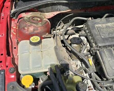 Красный Мазда 3, объемом двигателя 1.6 л и пробегом 205 тыс. км за 4938 $, фото 11 на Automoto.ua