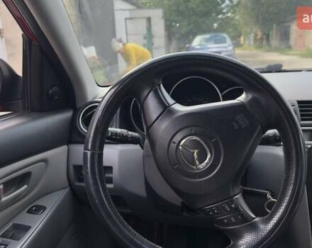 Червоний Мазда 3, об'ємом двигуна 1.6 л та пробігом 216 тис. км за 4100 $, фото 20 на Automoto.ua