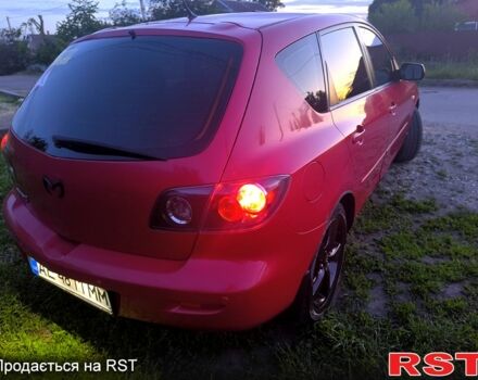 Красный Мазда 3, объемом двигателя 2 л и пробегом 255 тыс. км за 4800 $, фото 2 на Automoto.ua
