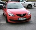 Красный Мазда 3, объемом двигателя 1.35 л и пробегом 215 тыс. км за 6000 $, фото 1 на Automoto.ua