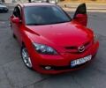 Красный Мазда 3, объемом двигателя 1.6 л и пробегом 240 тыс. км за 5000 $, фото 1 на Automoto.ua