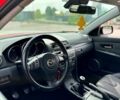 Красный Мазда 3, объемом двигателя 2.3 л и пробегом 244 тыс. км за 7999 $, фото 7 на Automoto.ua