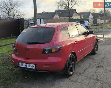 Красный Мазда 3, объемом двигателя 2 л и пробегом 256 тыс. км за 4800 $, фото 3 на Automoto.ua