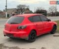 Червоний Мазда 3, об'ємом двигуна 1.6 л та пробігом 299 тис. км за 1999 $, фото 1 на Automoto.ua