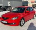 Красный Мазда 3, объемом двигателя 1.6 л и пробегом 139 тыс. км за 5999 $, фото 1 на Automoto.ua