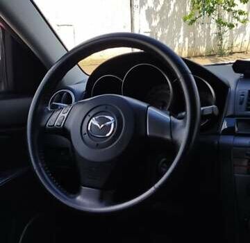 Красный Мазда 3, объемом двигателя 1.6 л и пробегом 133 тыс. км за 6600 $, фото 10 на Automoto.ua