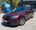 Красный Мазда 3, объемом двигателя 1.6 л и пробегом 314 тыс. км за 4800 $, фото 1 на Automoto.ua
