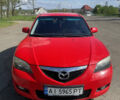 Красный Мазда 3, объемом двигателя 1.6 л и пробегом 214 тыс. км за 4200 $, фото 1 на Automoto.ua