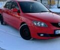 Красный Мазда 3, объемом двигателя 1.3 л и пробегом 300 тыс. км за 5000 $, фото 1 на Automoto.ua