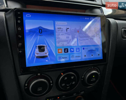 Красный Мазда 3, объемом двигателя 1.6 л и пробегом 220 тыс. км за 5799 $, фото 20 на Automoto.ua