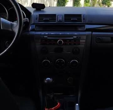 Красный Мазда 3, объемом двигателя 1.6 л и пробегом 133 тыс. км за 6600 $, фото 9 на Automoto.ua