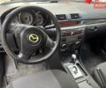 Красный Мазда 3, объемом двигателя 1.6 л и пробегом 234 тыс. км за 5500 $, фото 5 на Automoto.ua