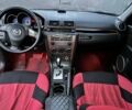 Красный Мазда 3, объемом двигателя 1.6 л и пробегом 149 тыс. км за 6500 $, фото 1 на Automoto.ua