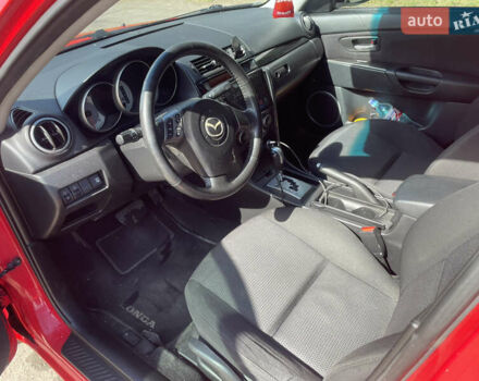 Красный Мазда 3, объемом двигателя 1.6 л и пробегом 214 тыс. км за 4200 $, фото 7 на Automoto.ua