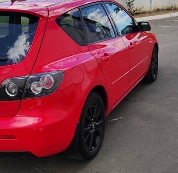 Красный Мазда 3, объемом двигателя 1.6 л и пробегом 133 тыс. км за 6600 $, фото 3 на Automoto.ua