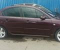 Красный Мазда 3, объемом двигателя 2 л и пробегом 250 тыс. км за 4800 $, фото 4 на Automoto.ua