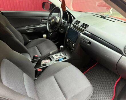 Мазда 3 2007 в Хмельнике на Automoto.ua Красный Мазда 3, объемом двигателя 1.6 л и пробегом 150 тыс. км за 5600 $, фото 7 на Automoto.ua