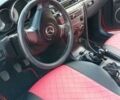 Червоний Мазда 3, об'ємом двигуна 1.6 л та пробігом 240 тис. км за 6000 $, фото 6 на Automoto.ua