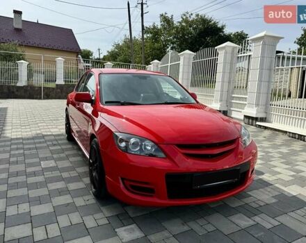 Красный Мазда 3, объемом двигателя 2.3 л и пробегом 103 тыс. км за 9800 $, фото 4 на Automoto.ua