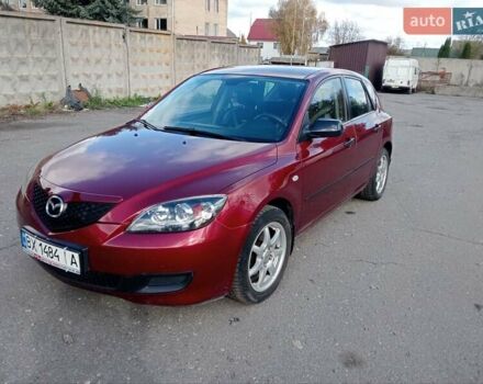 Червоний Мазда 3, об'ємом двигуна 1.35 л та пробігом 173 тис. км за 6200 $, фото 4 на Automoto.ua