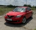 Красный Мазда 3, объемом двигателя 1.6 л и пробегом 264 тыс. км за 5500 $, фото 1 на Automoto.ua