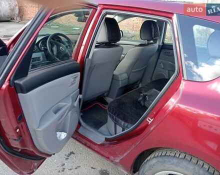 Червоний Мазда 3, об'ємом двигуна 1.35 л та пробігом 173 тис. км за 6200 $, фото 1 на Automoto.ua