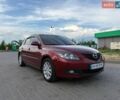 Червоний Мазда 3, об'ємом двигуна 1.6 л та пробігом 215 тис. км за 6500 $, фото 1 на Automoto.ua